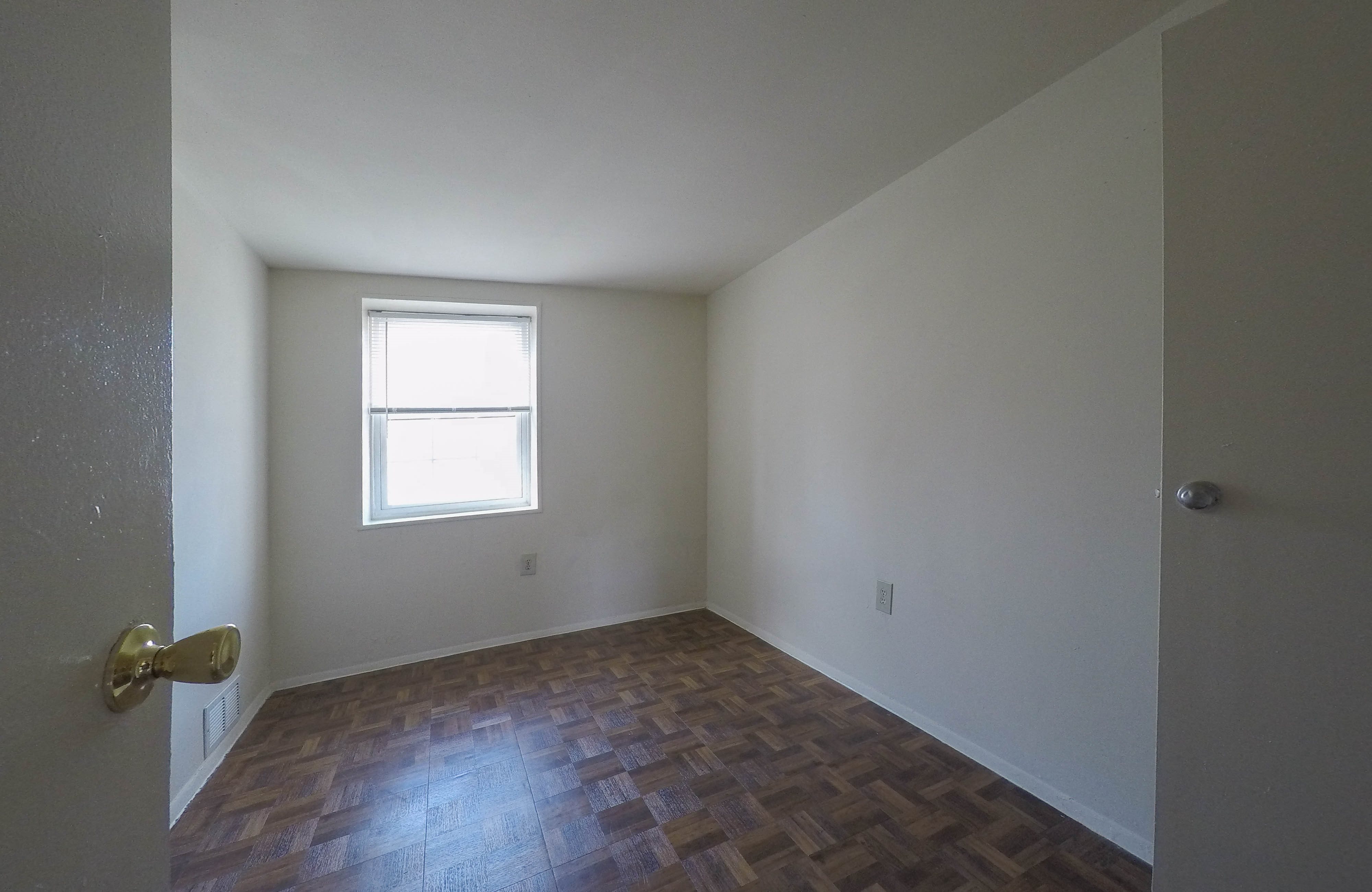 Bedroom with large windows